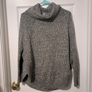 Oversized grey turtleneck with subtle colored speckles